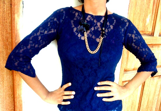 I'm wearing my sewn blue lace top and the necklace I made